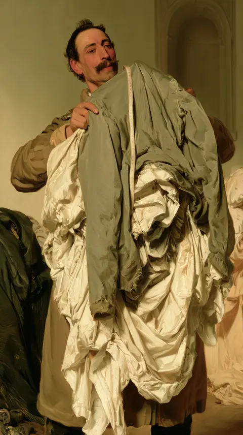 裁缝的针脚 · 竖幅 / Adult tailor supports a folded unfinished garment · Portrait