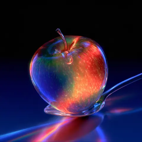 A Glass Apple on a Spoon