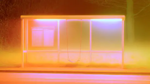 杏桃光晕梦境 · 新创作横幅 / empty tram shelter stands in a meadow of knee-high fog, with one suspended · Landscape